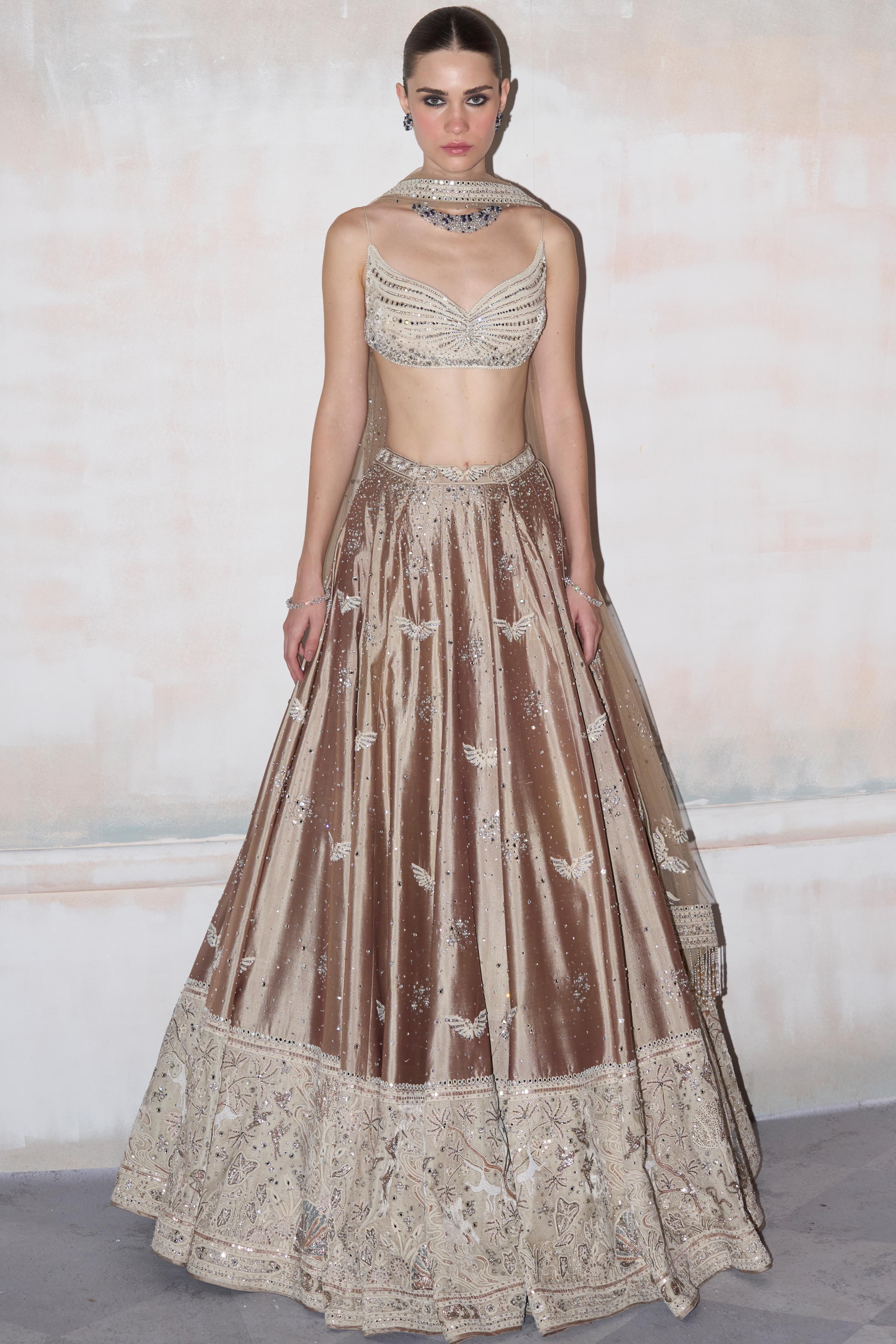 The Wild Matsya Champagne on Silk Lehenga
