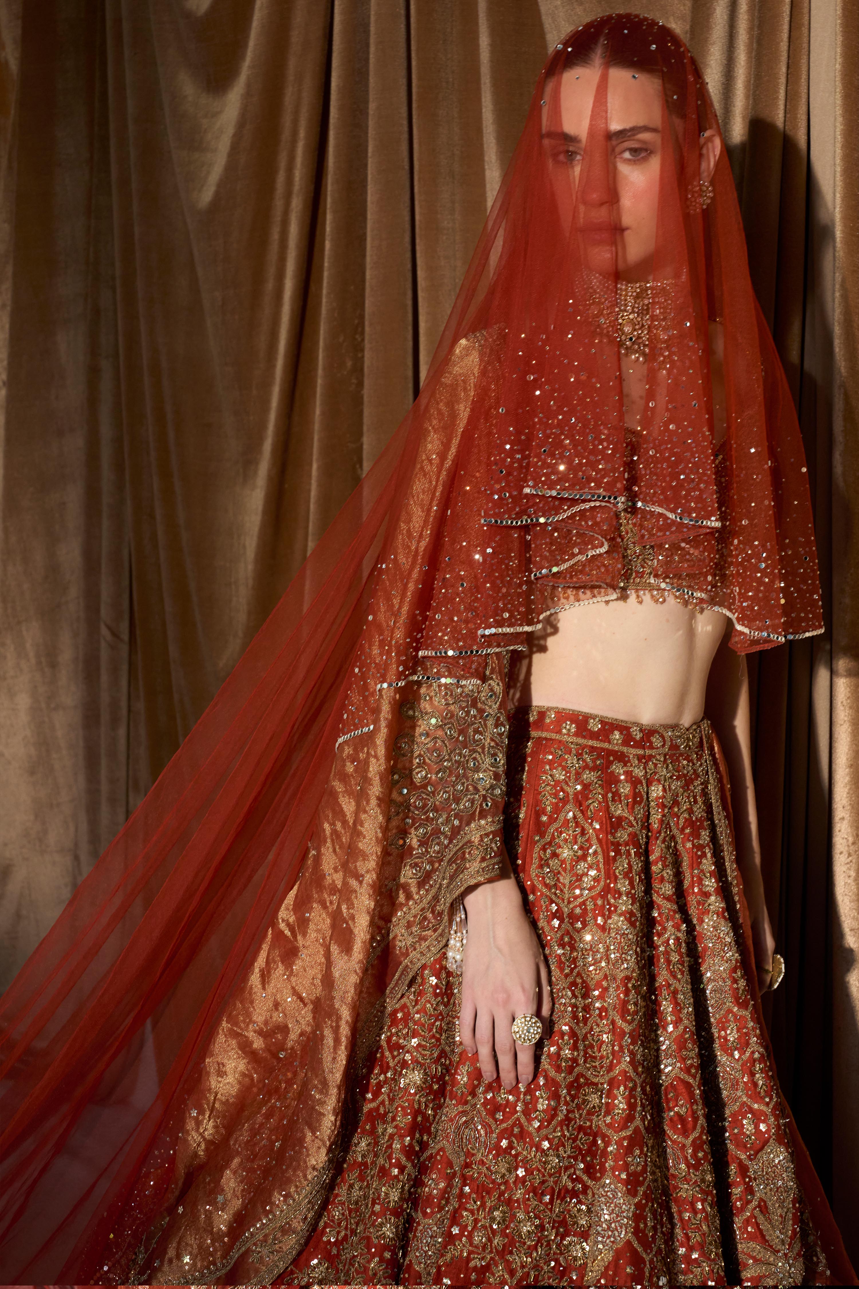 The Vintage Lotus Pond Aged Tangerine Lehenga