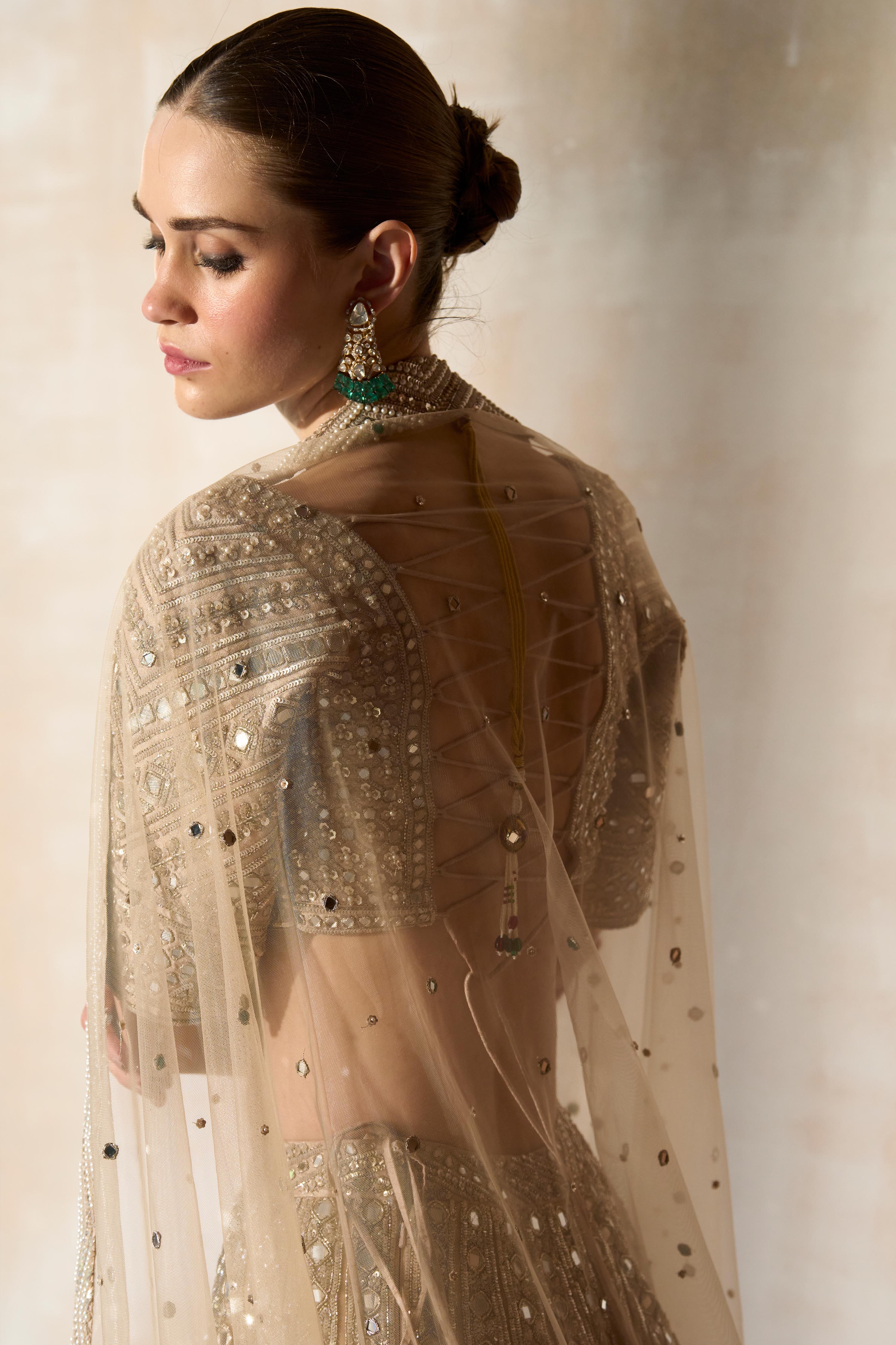 The New Sheeshbagh Matsya Ekru Lehenga