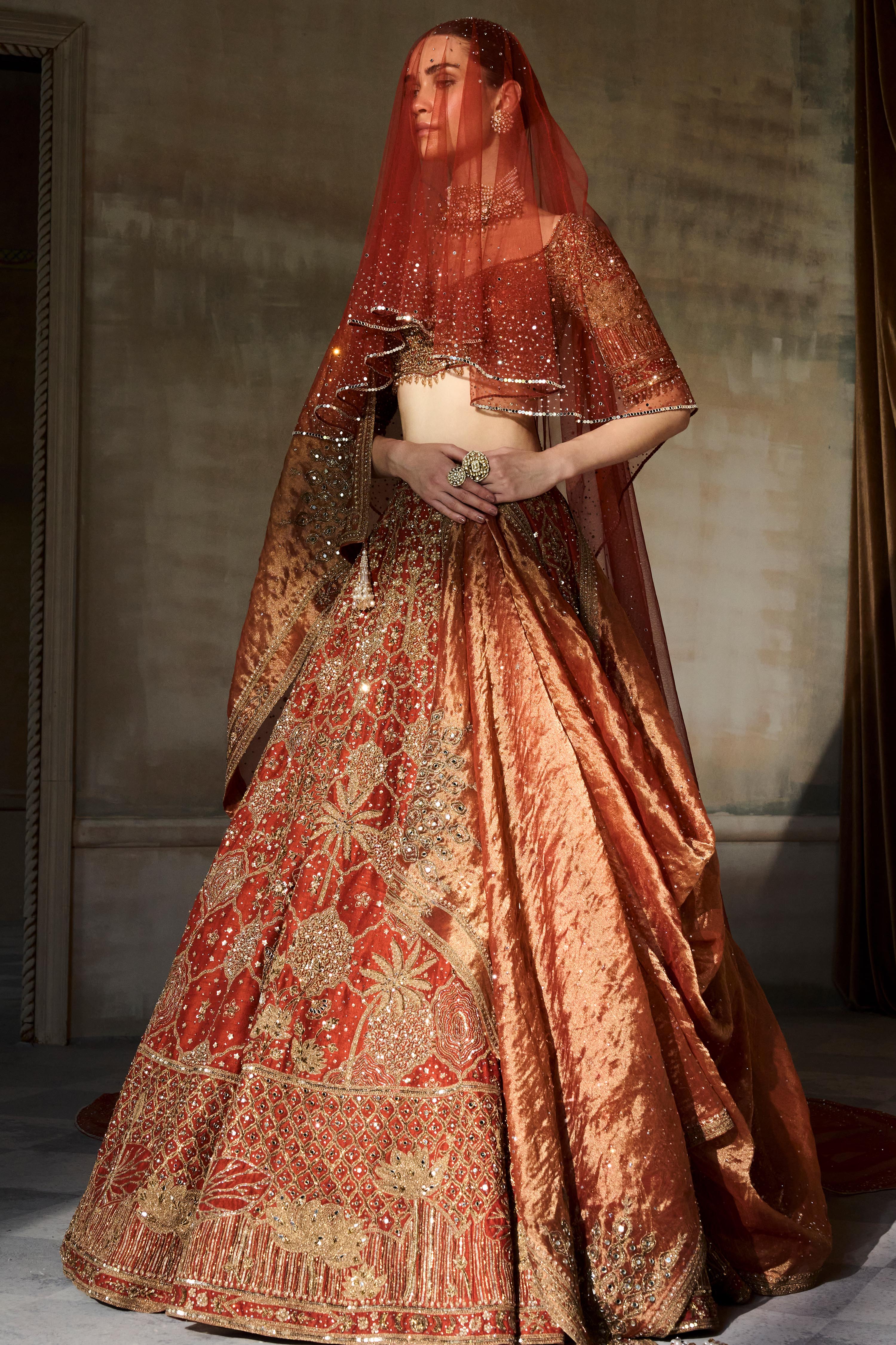 The Vintage Lotus Pond Aged Tangerine Lehenga